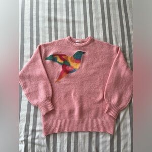 pink wool sweater with colorful bird